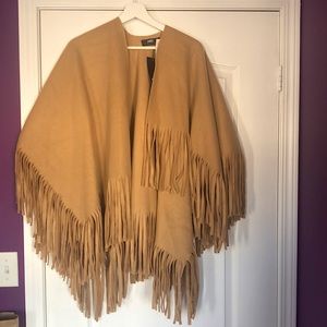 Brown poncho with tassels